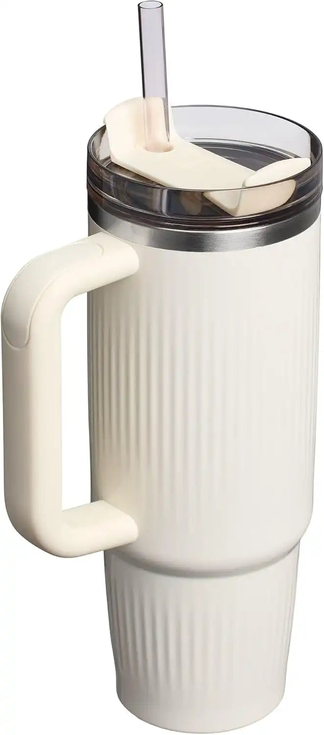 STANLEY Quencher H2.0 Tumbler with Handle and Straw 30 oz | Flowstate 3-Position Lid | Cup Holder Compatible for Travel | Insulated Stainless Steel Cup | BPA-Free | Fluted Cream Gloss