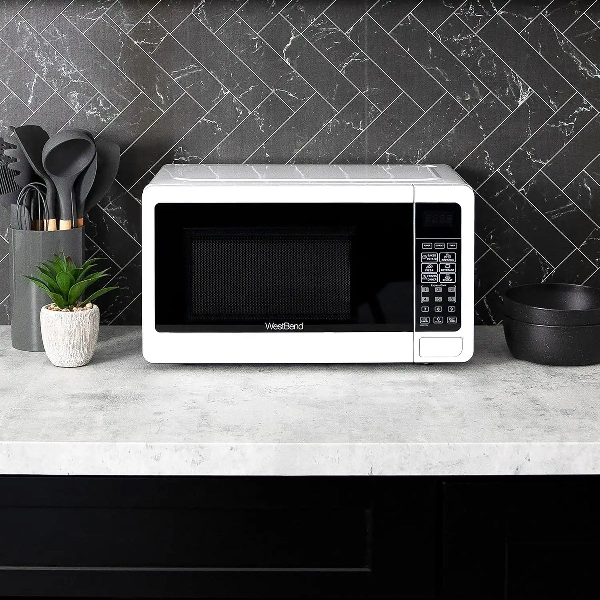 West Bend 0.7 Cu. Ft. Countertop Microwave Oven, 700W with 6 Pre-Programmed Cooking Settings, Speed Defrost, Electronic Control Panel, Rotating Glass Turntable, Add 30 Seconds Button, White